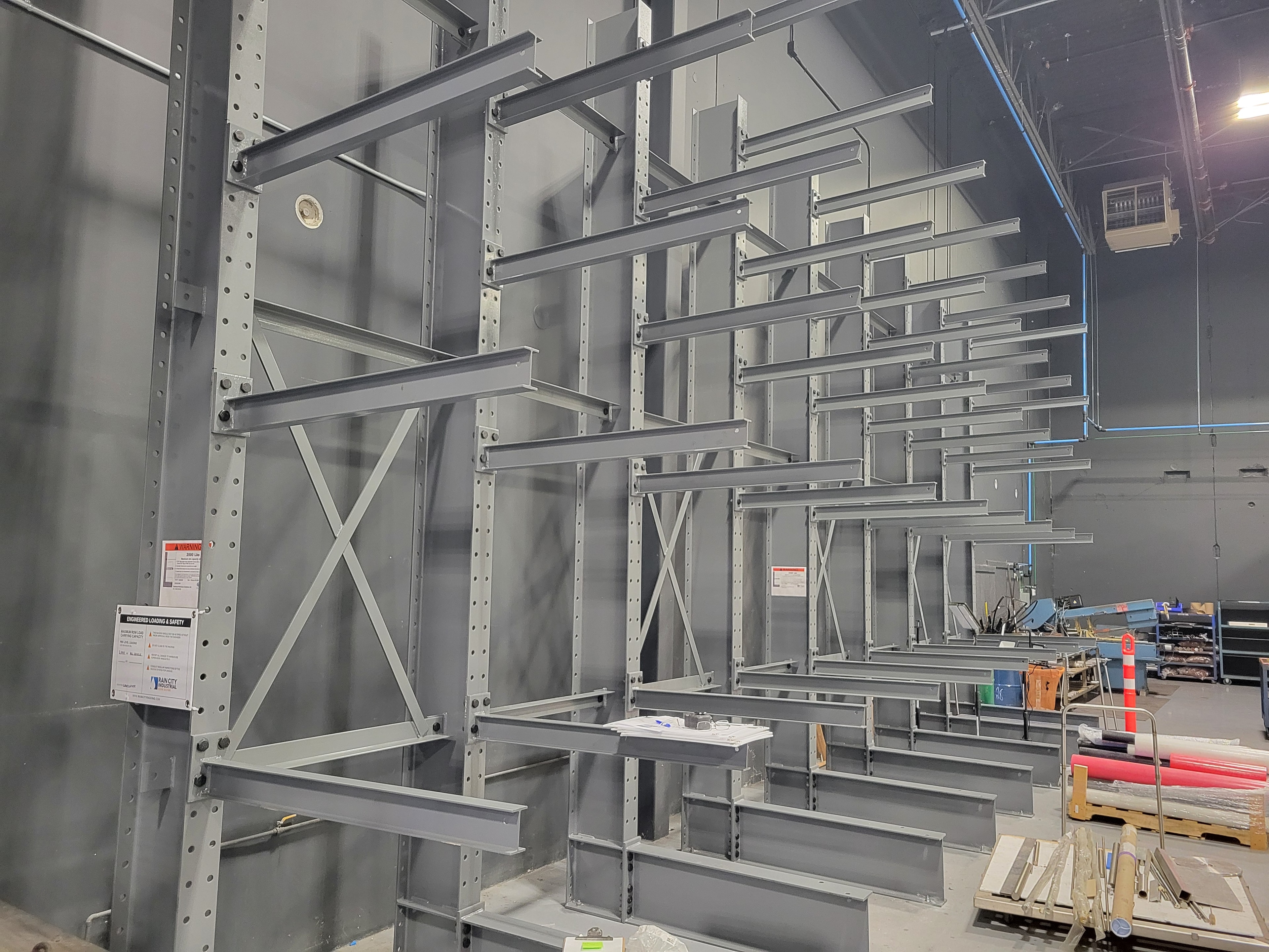 Single-sided cantilever warehouse storage system
